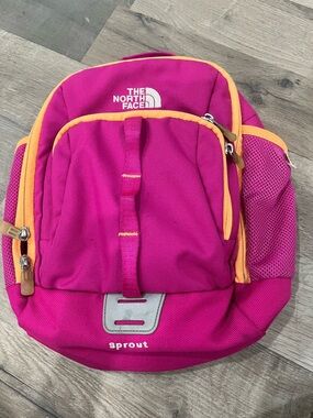 The North Face Magenta Backpack with Peach Trim
